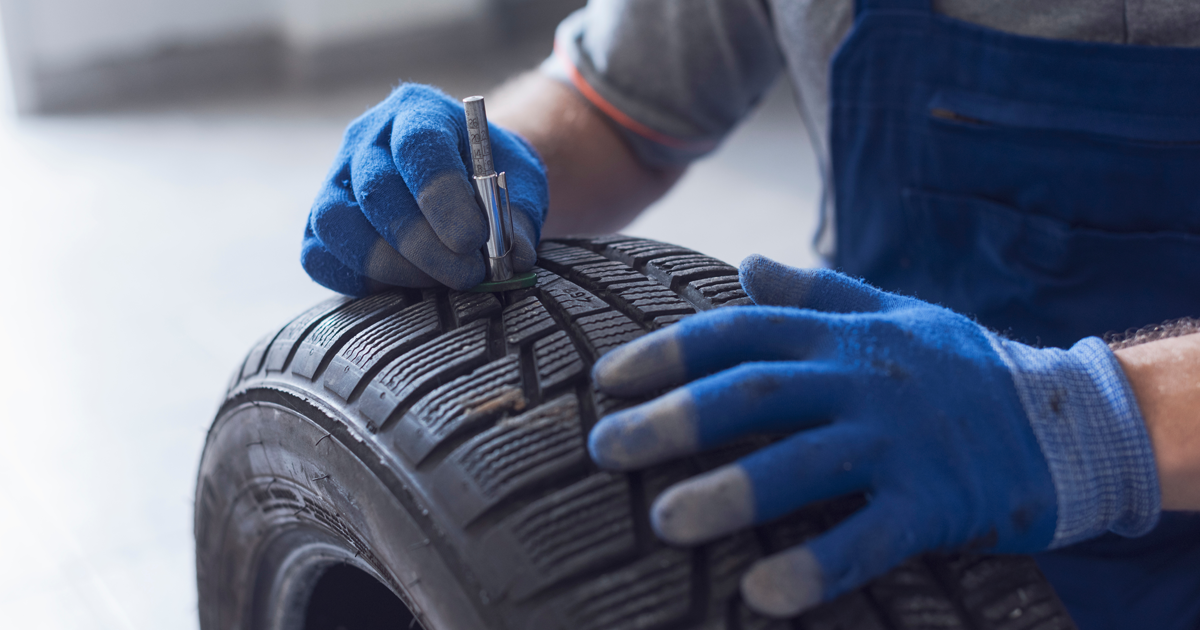 A tire is being checked to make sure it is ready for the road.